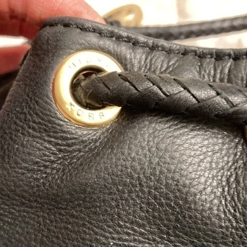 Michael kors mini black leather drawstring bag